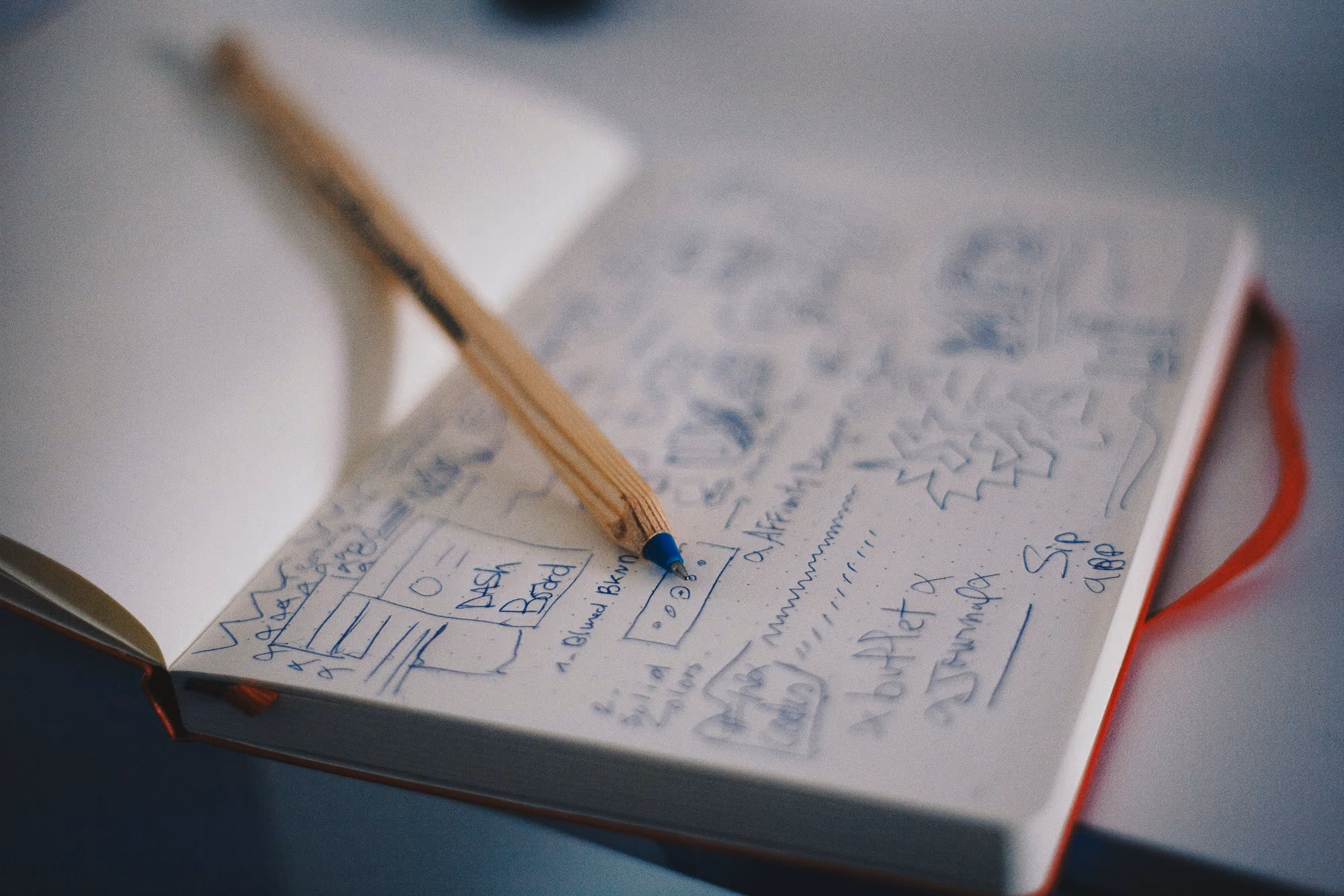 Sketchbook with pencil drafts