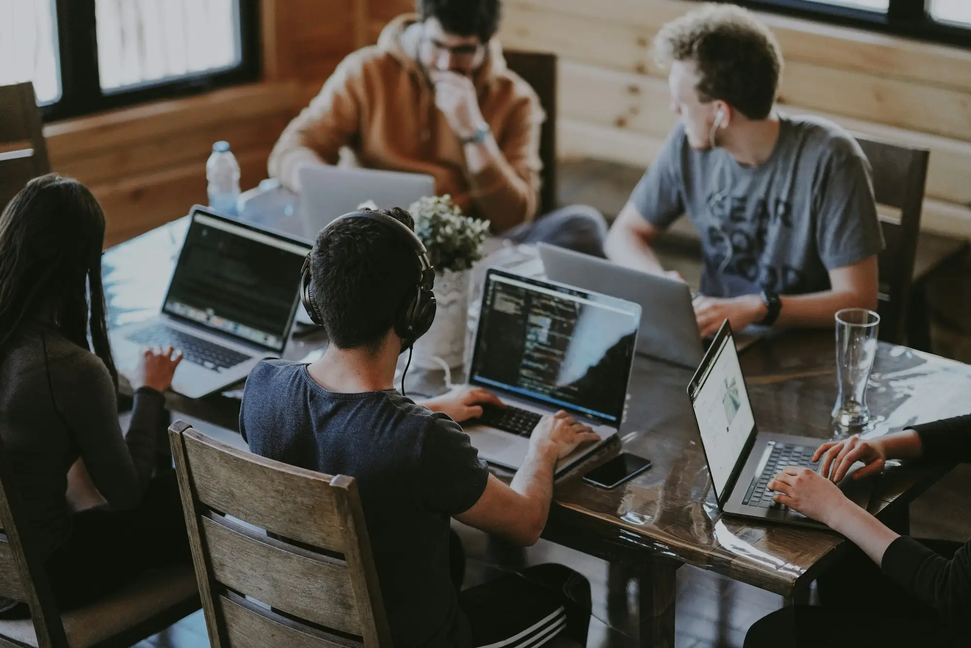 A team working together on laptops